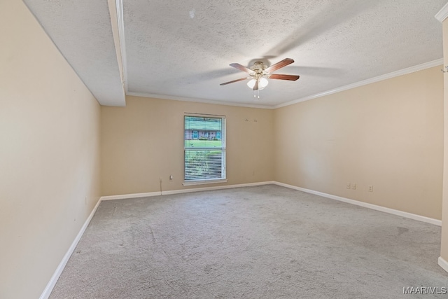 spare room featuring light carpet, crown molding, a textured ceiling, and ceiling fan