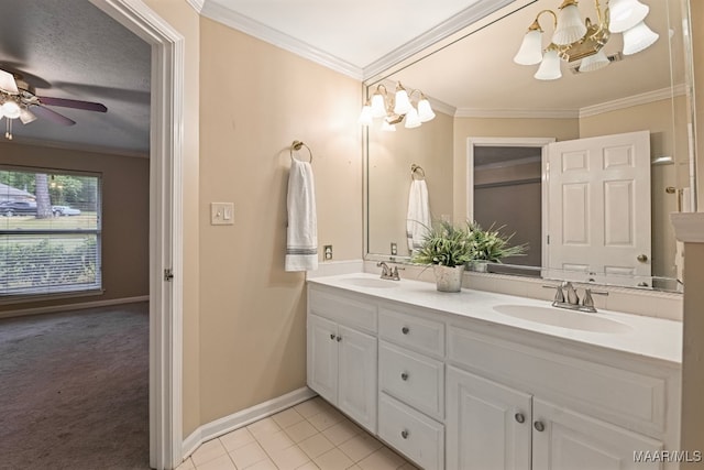 bathroom featuring vanity, tile patterned floors, ornamental molding, and ceiling fan with notable chandelier