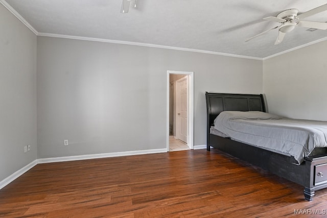 bedroom with crown molding, dark wood-type flooring, and ceiling fan