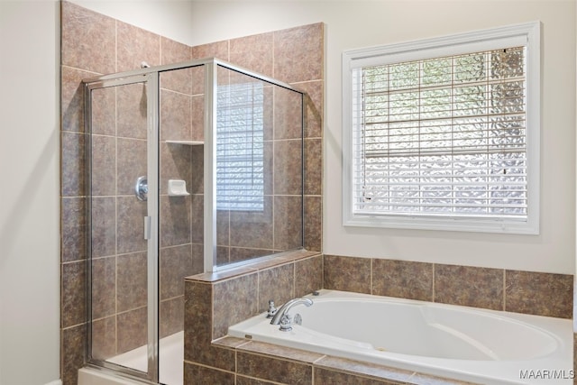 bathroom featuring plus walk in shower