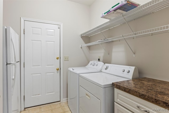 laundry room with washer and clothes dryer