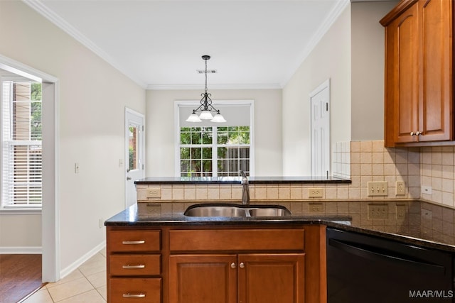 kitchen featuring dishwasher, crown molding, and a wealth of natural light