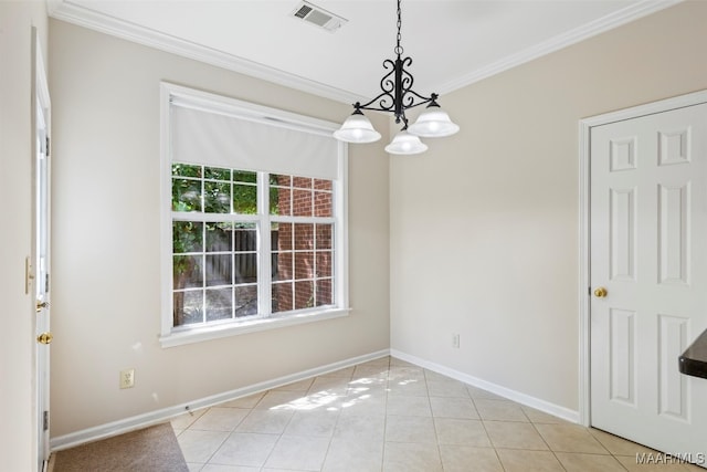 spare room featuring an inviting chandelier, light tile patterned floors, and crown molding