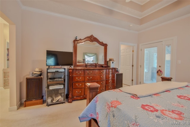 carpeted bedroom featuring ornamental molding, radiator, and access to exterior