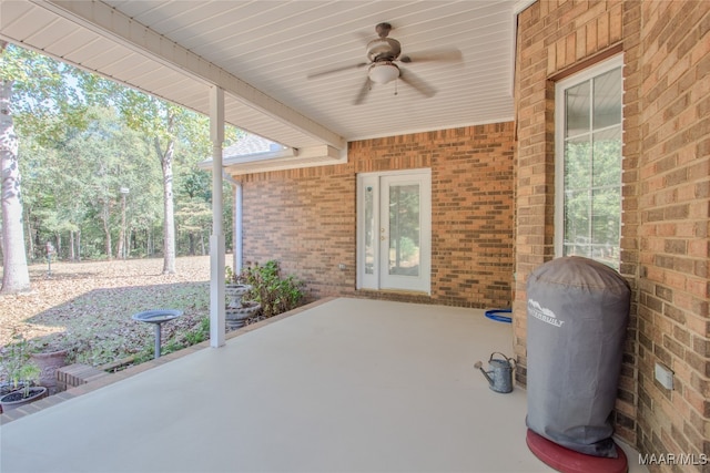 view of patio featuring ceiling fan