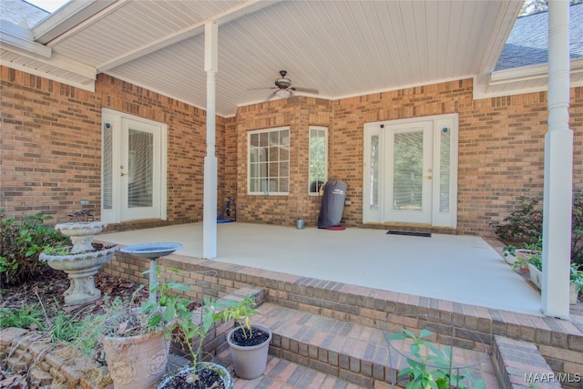 exterior space with ceiling fan