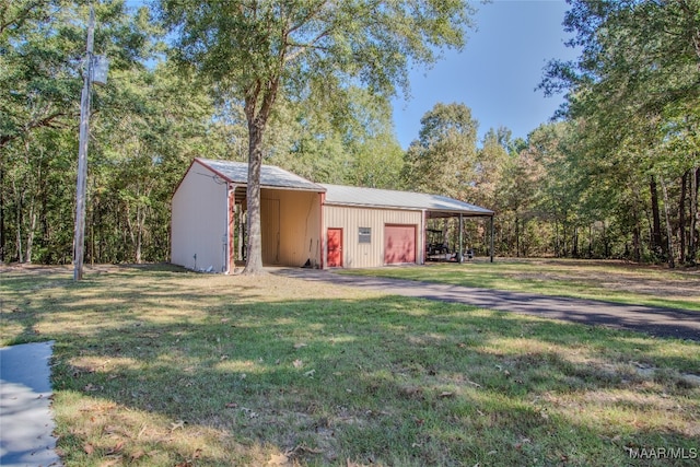 view of outbuilding with a lawn