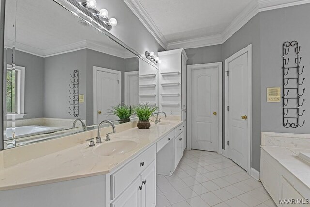 bathroom with vanity, crown molding, and tile patterned floors