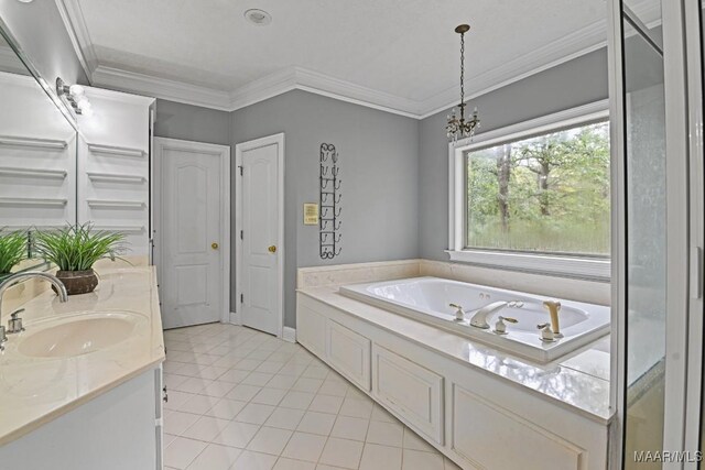 bathroom featuring a bath, ornamental molding, tile patterned flooring, and vanity