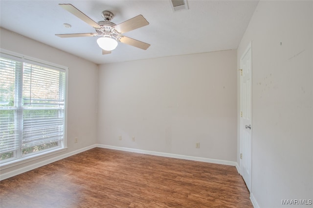 unfurnished room featuring hardwood / wood-style floors and ceiling fan