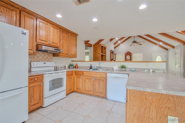 kitchen featuring white appliances, sink, lofted ceiling with beams, kitchen peninsula, and ceiling fan