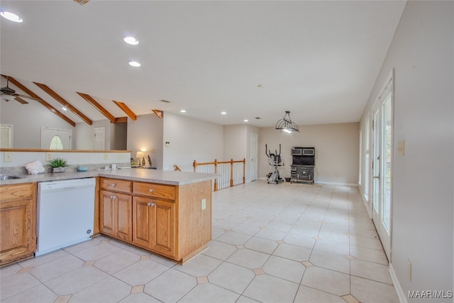 kitchen featuring lofted ceiling with beams, white dishwasher, kitchen peninsula, ceiling fan, and pendant lighting