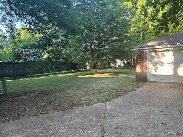 view of yard with a garage