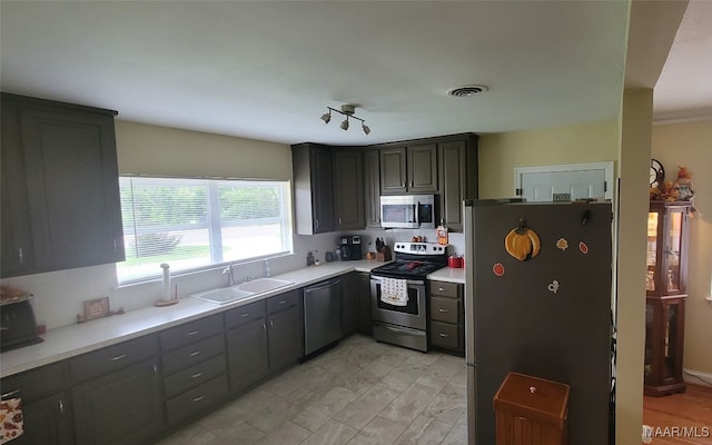 kitchen with appliances with stainless steel finishes and sink