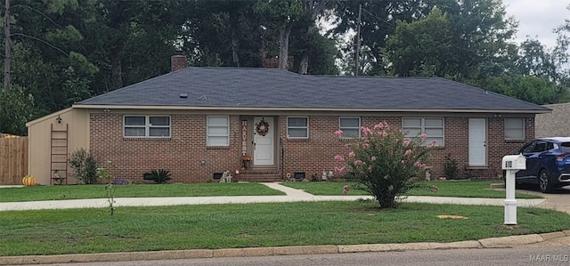 view of front facade featuring a front lawn