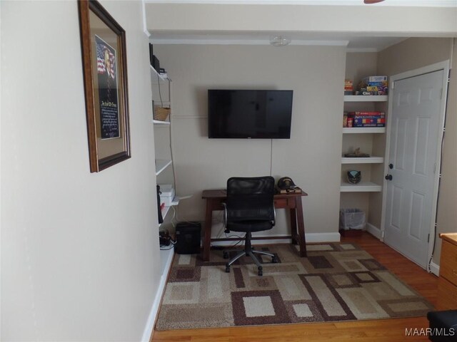 office with hardwood / wood-style flooring