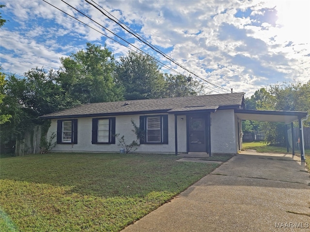 ranch-style home with a front yard and a carport