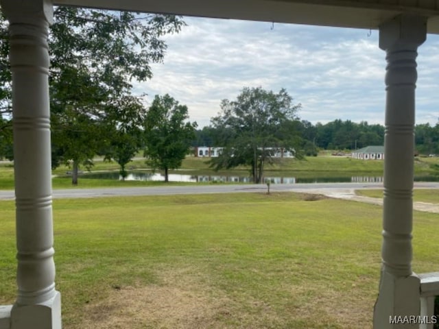 view of yard with a water view