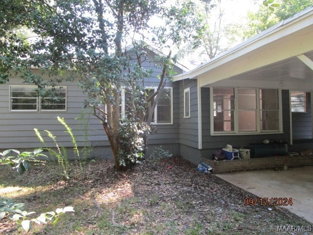 view of home's exterior featuring a patio