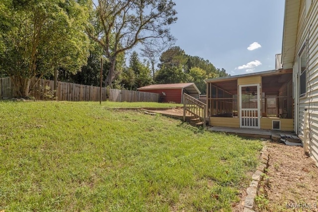 view of yard featuring a sunroom