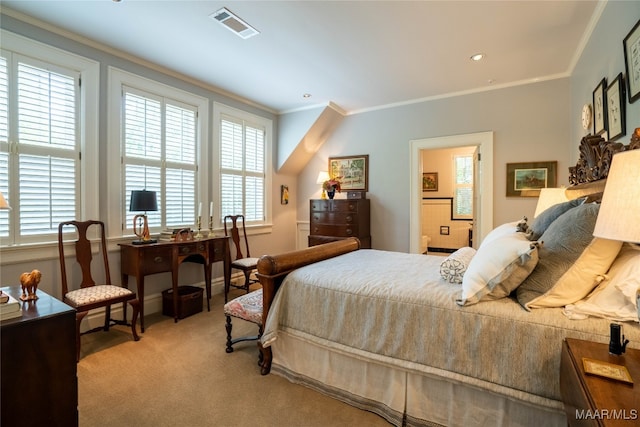 carpeted bedroom featuring crown molding