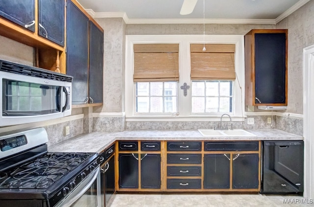 kitchen with ceiling fan, appliances with stainless steel finishes, crown molding, and sink