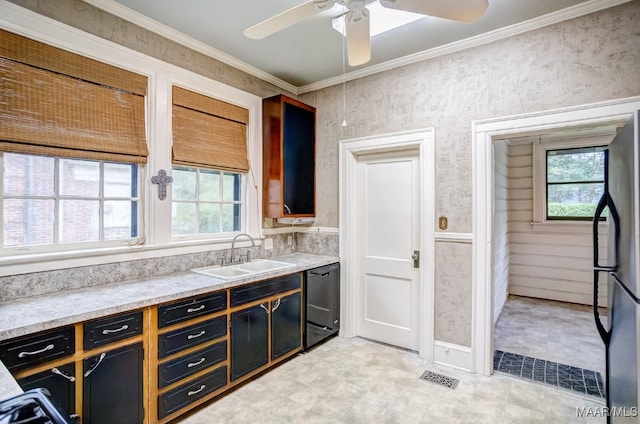 kitchen with ceiling fan, ornamental molding, sink, dishwasher, and stainless steel refrigerator