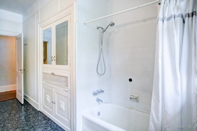 bathroom featuring vanity and shower / bath combo