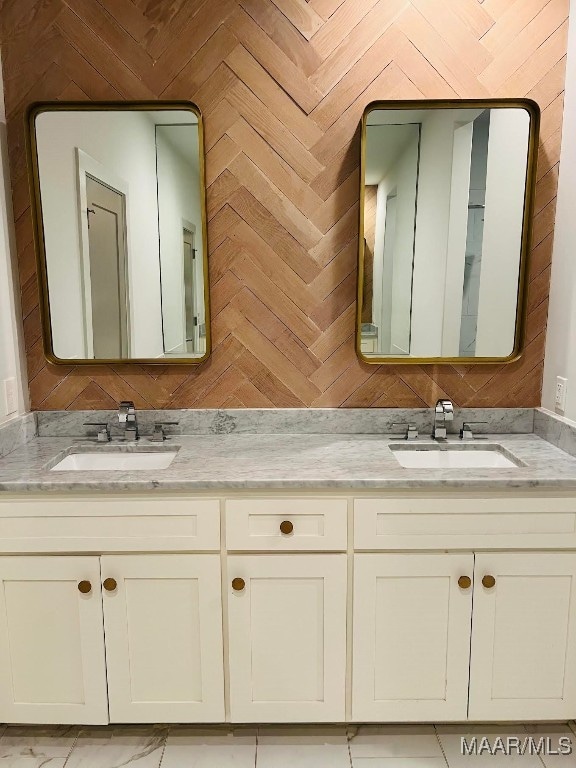 bathroom with wooden walls and vanity