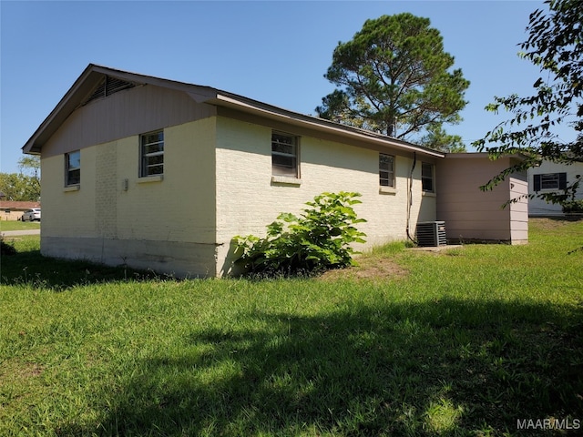 view of home's exterior featuring a lawn