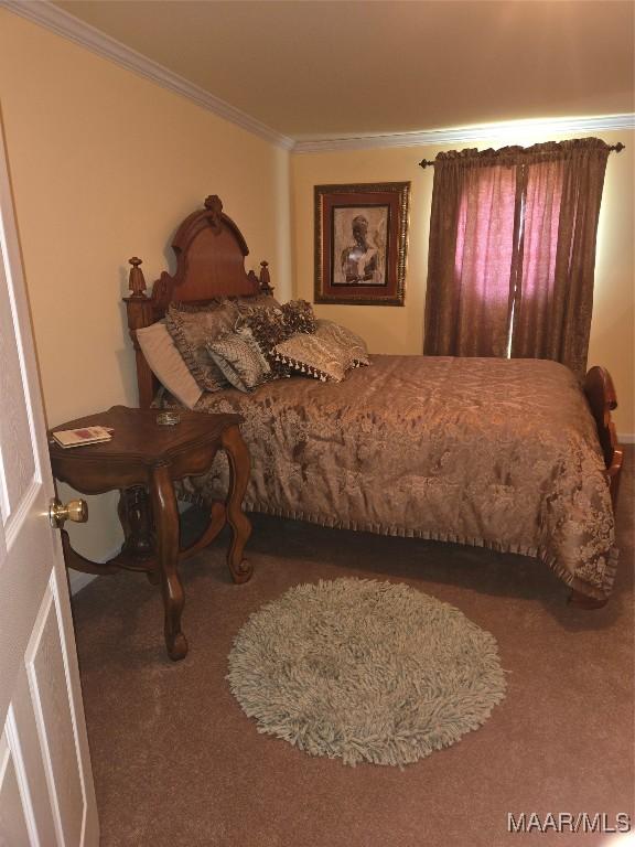 1715 County Road 2203rd Rd, Goshen, AL 36035 - carpeted bedroom featuring crown molding