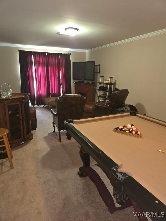 recreation room featuring pool table, carpet, and ornamental molding