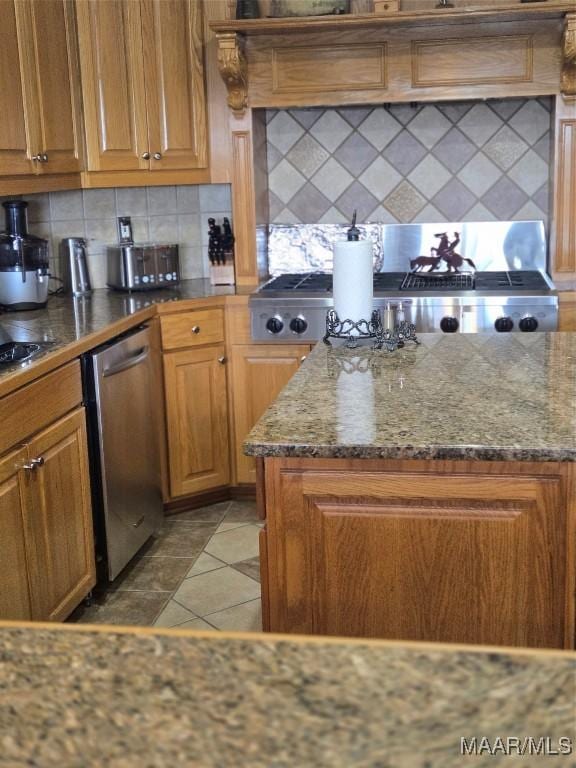 1715 County Road 2203rd Rd, Goshen, AL 36035 - kitchen featuring light tile patterned flooring, backsplash, dishwasher, brown cabinets, and custom range hood