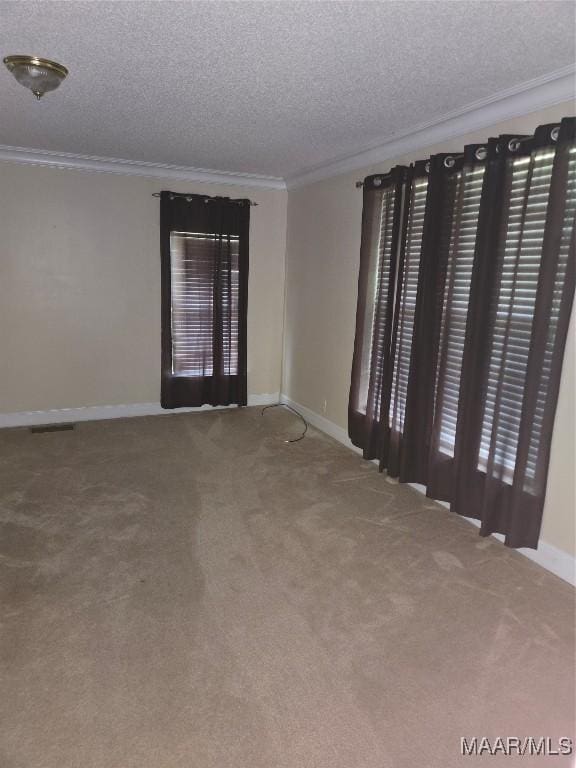1715 County Road 2203rd Rd, Goshen, AL 36035 - unfurnished room featuring baseboards, crown molding, carpet, and a textured ceiling