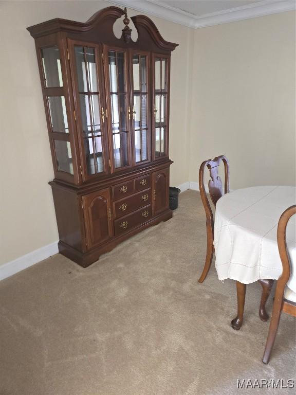 1715 County Road 2203rd Rd, Goshen, AL 36035 - dining room with ornamental molding, carpet, and baseboards