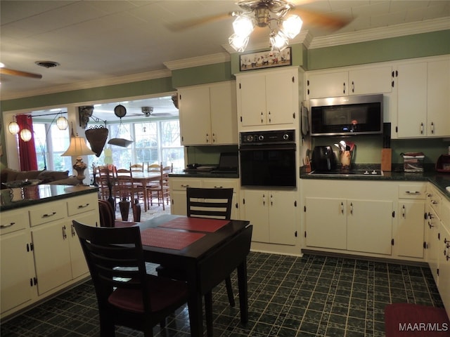 kitchen featuring ornamental molding, white cabinets, black appliances, and ceiling fan