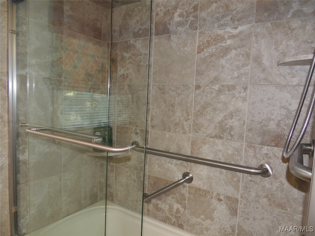 bathroom with an enclosed shower