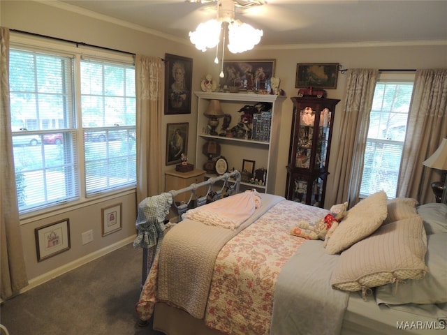 carpeted bedroom featuring crown molding, multiple windows, and ceiling fan