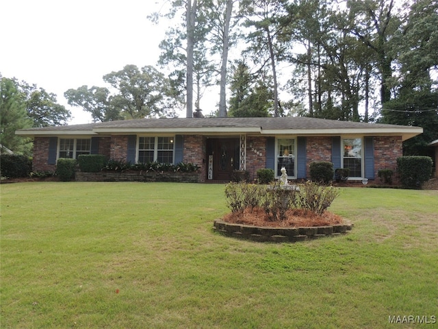 ranch-style house with a front lawn