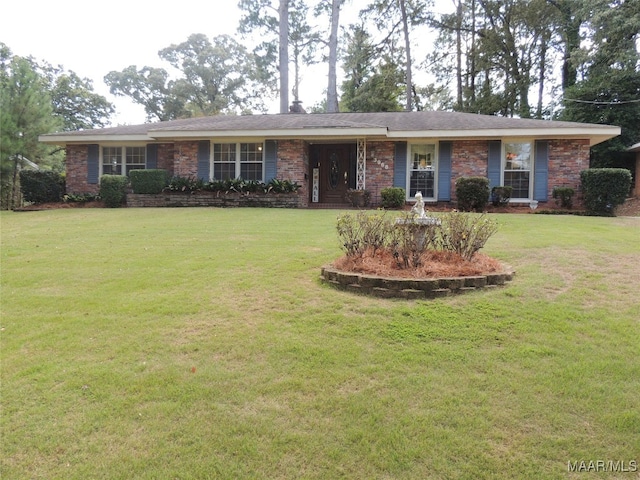 ranch-style house featuring a front lawn