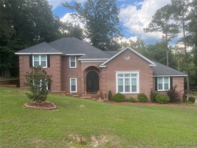 view of front of house with a front lawn