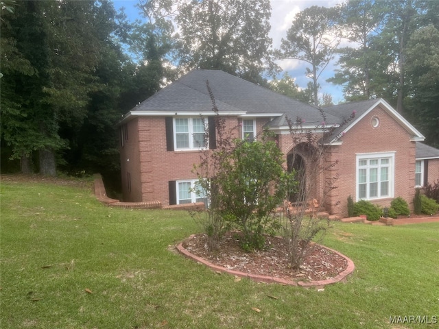 view of front of home with a front yard