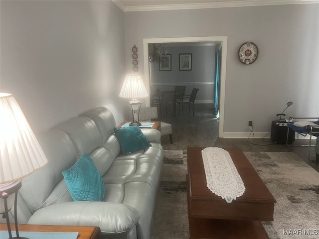 living room with crown molding and dark hardwood / wood-style floors