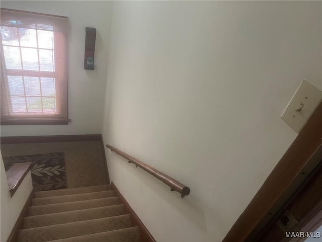 stairway with baseboards