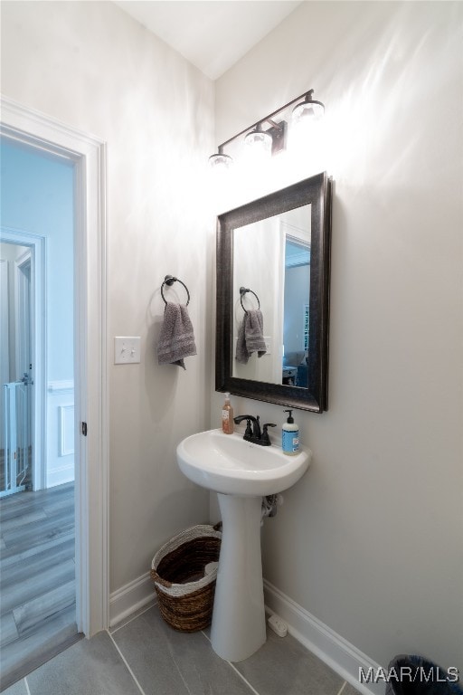 bathroom featuring hardwood / wood-style flooring