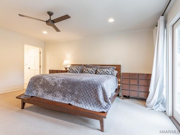carpeted bedroom with recessed lighting, baseboards, ornamental molding, and ceiling fan