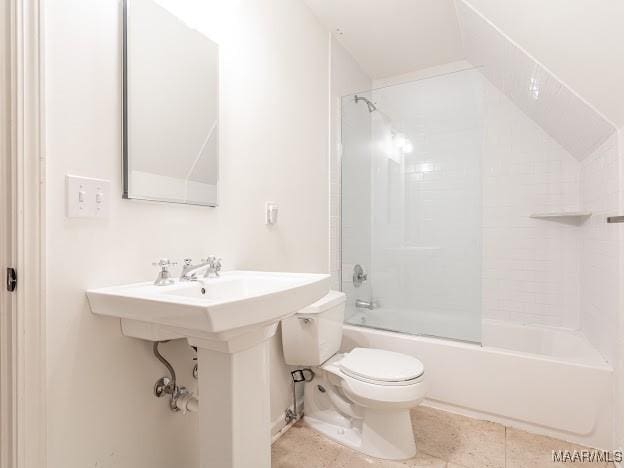 full bath with toilet, tile patterned flooring, and shower / bath combination