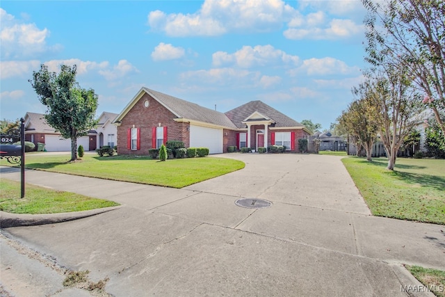 single story home featuring a front lawn and a garage