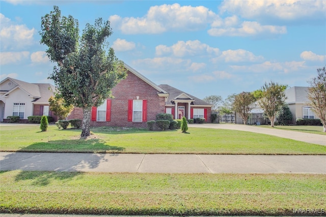 view of front of home with a front lawn