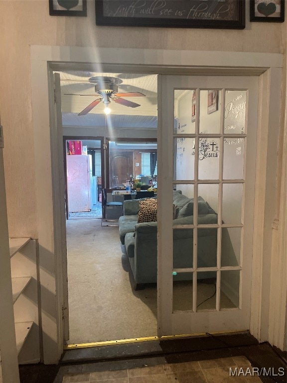 living room with ceiling fan